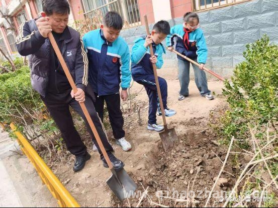 光明小学植树节活动：播种绿色，共筑美丽校园 植树节里光明小学行动：师生共绘校园生态新画卷